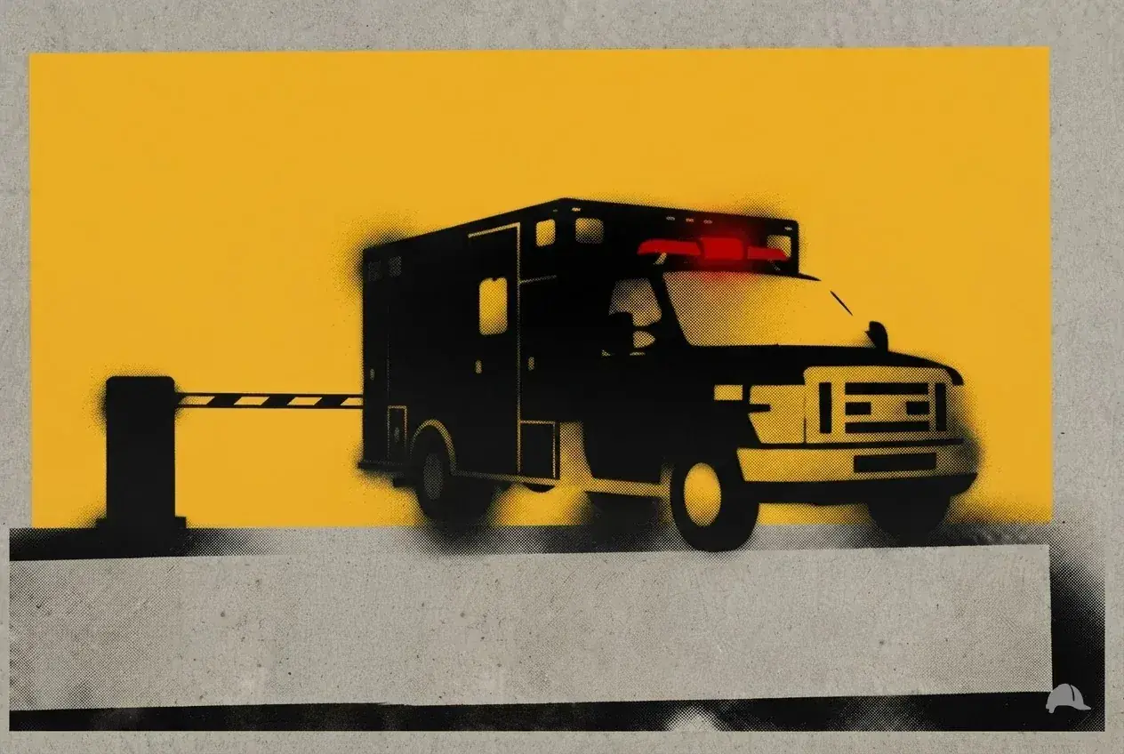 Stencil print of an ambulance at a site gate
